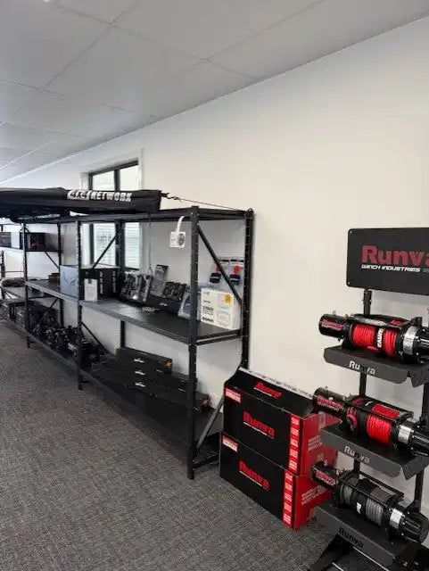 Store display of automotive winches and accessories.